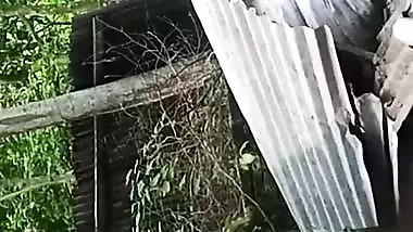 Village neighbor girl outdoor bath caught through hole