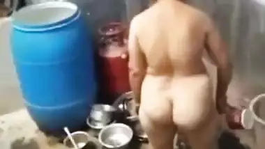 Video from , village aunty taking bath in outdoor taken by her son