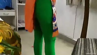 Homely girl in hot leggings at home