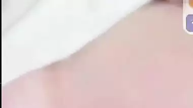 Smiling girlfriend video call to boyfriend shows boobs